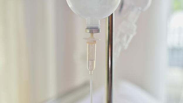 hospital equipment background image. A saline bag hung in the ward room. xkwx disease medicine dri